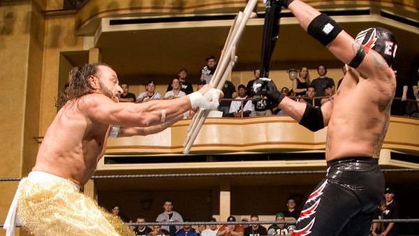 The homicidal, genocidal, suicidal Sabu takes the fight to Rey Misterio with a steel chair